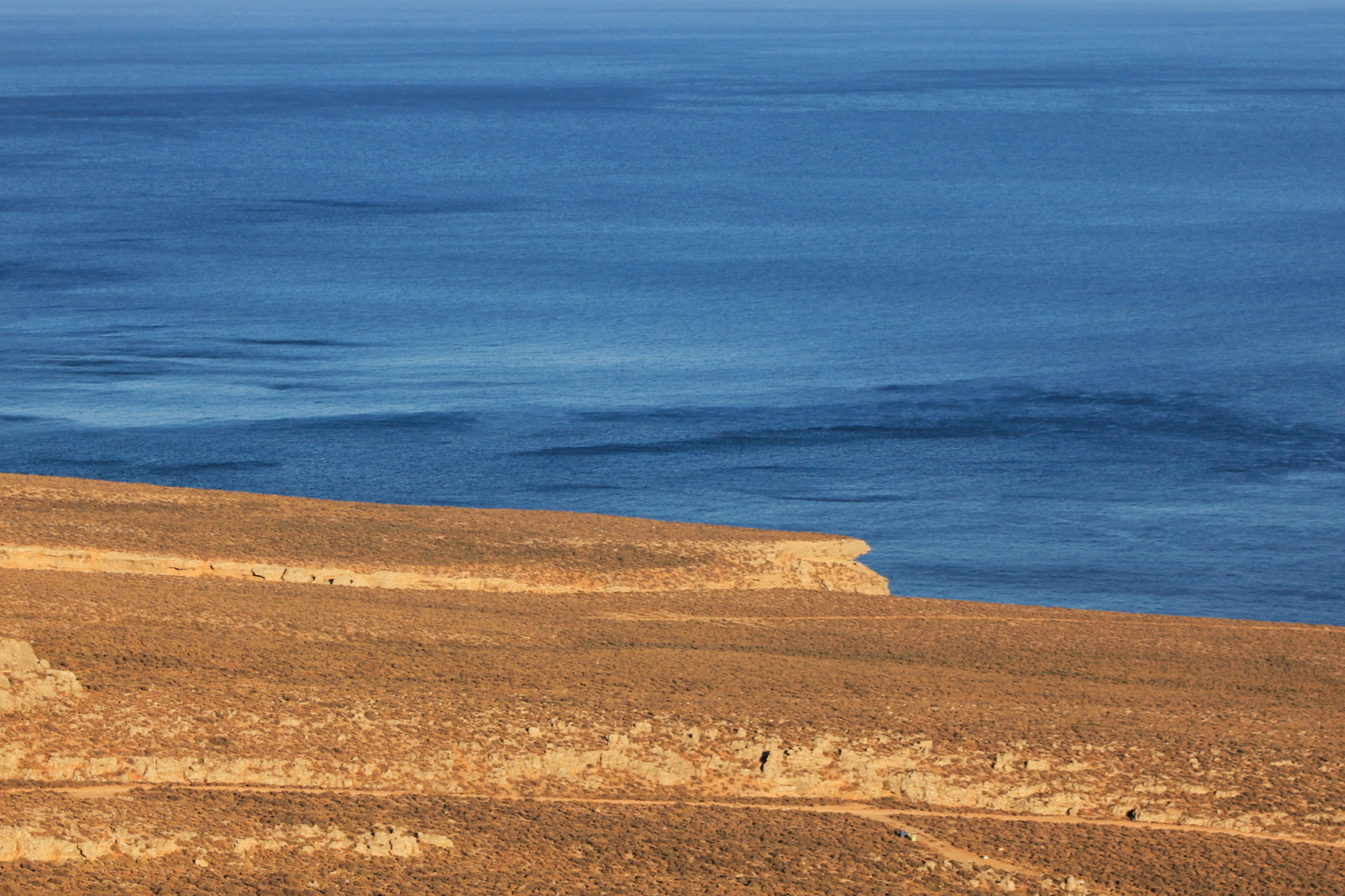 Seascape photograph titled Land vs Sea